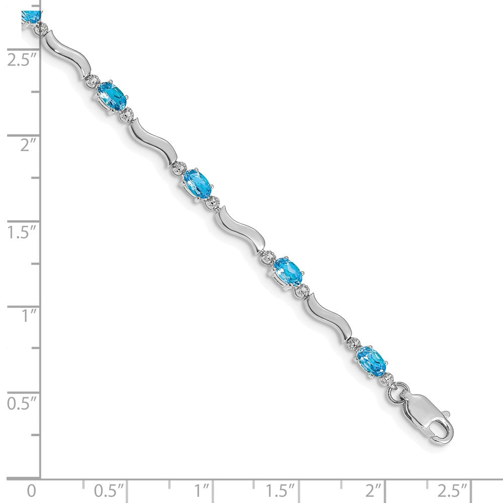 14k White Gold Fancy Diamond and Blue Topaz Bracelet