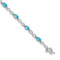 14k White Gold Blue Topaz and Diamond Infinity Bracelet