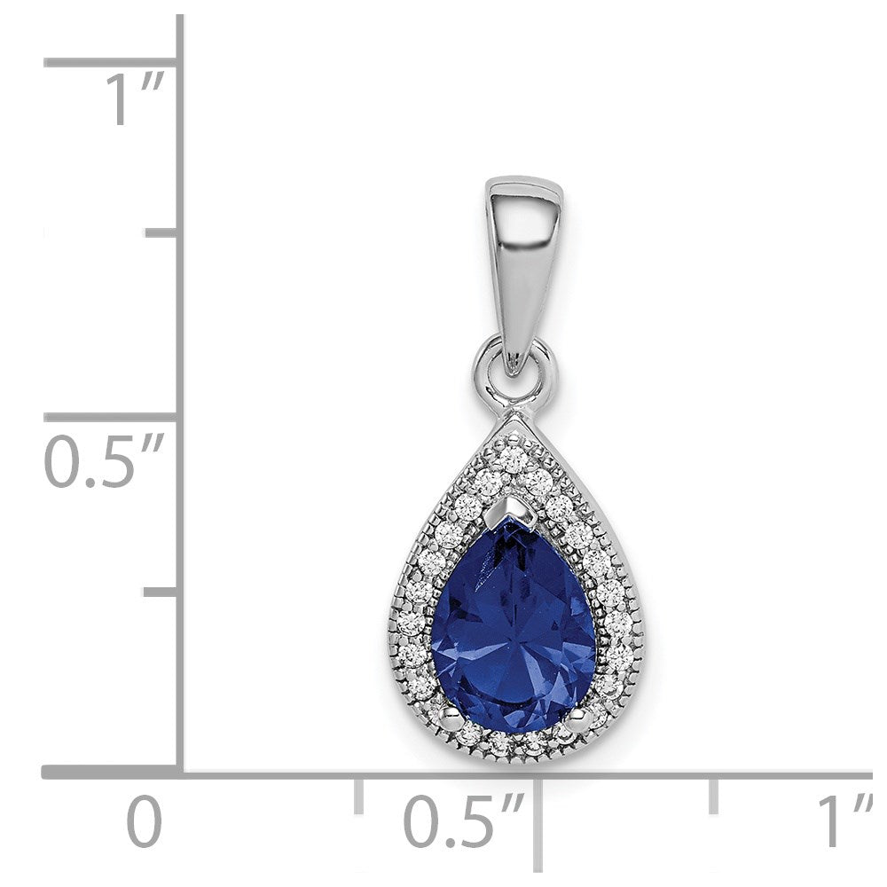 Sterling Silver Rhodium Plated Blue and Clear CZ Pendant