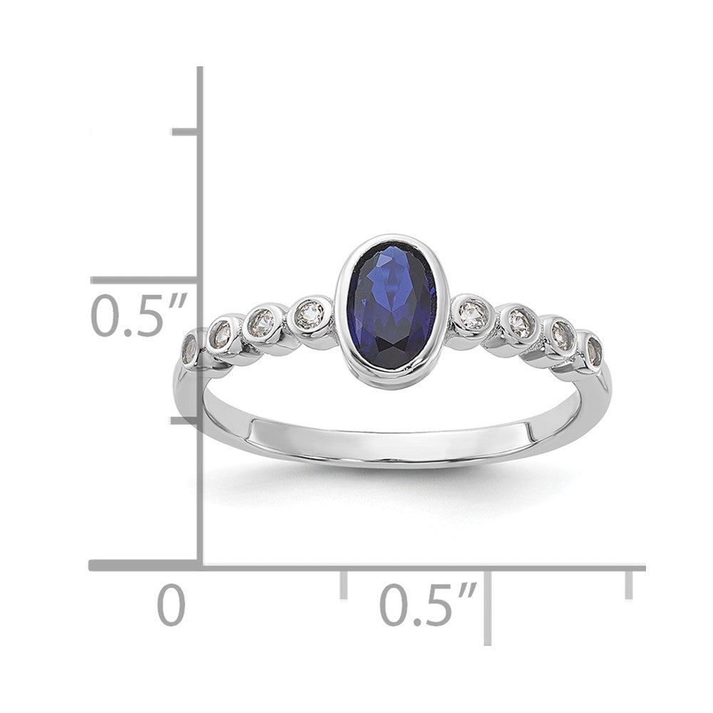 SS Rh-plated .01Created White Sapphire .56Created Blue Spinel Ring