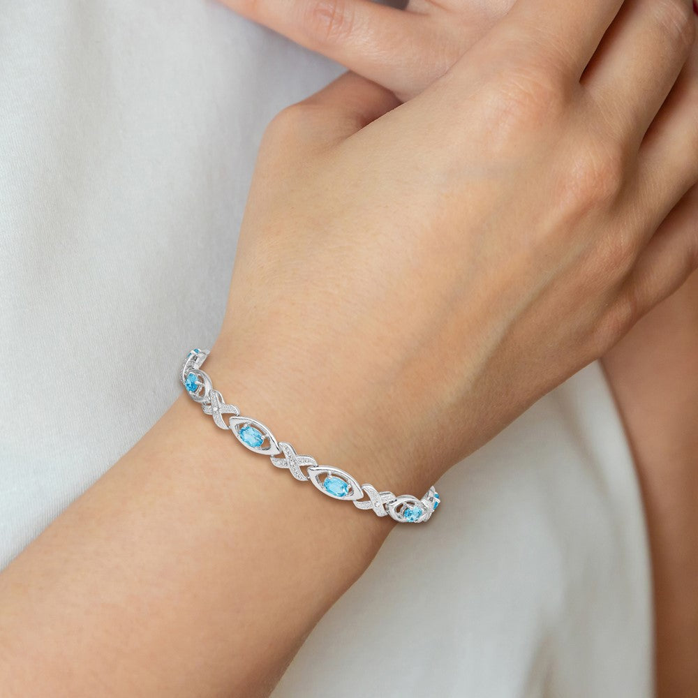 Sterling Silver Rhodium-plated Diamond & Light Swiss Blue Topaz Bracelet