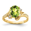 14k 9x7mm Oval Peridot A Diamond ring
