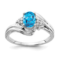 14k White Gold 7x5mm Oval Blue Topaz VS Diamond ring