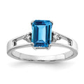 14k White Gold 7x5mm Emerald Cut Blue Topaz A Diamond ring